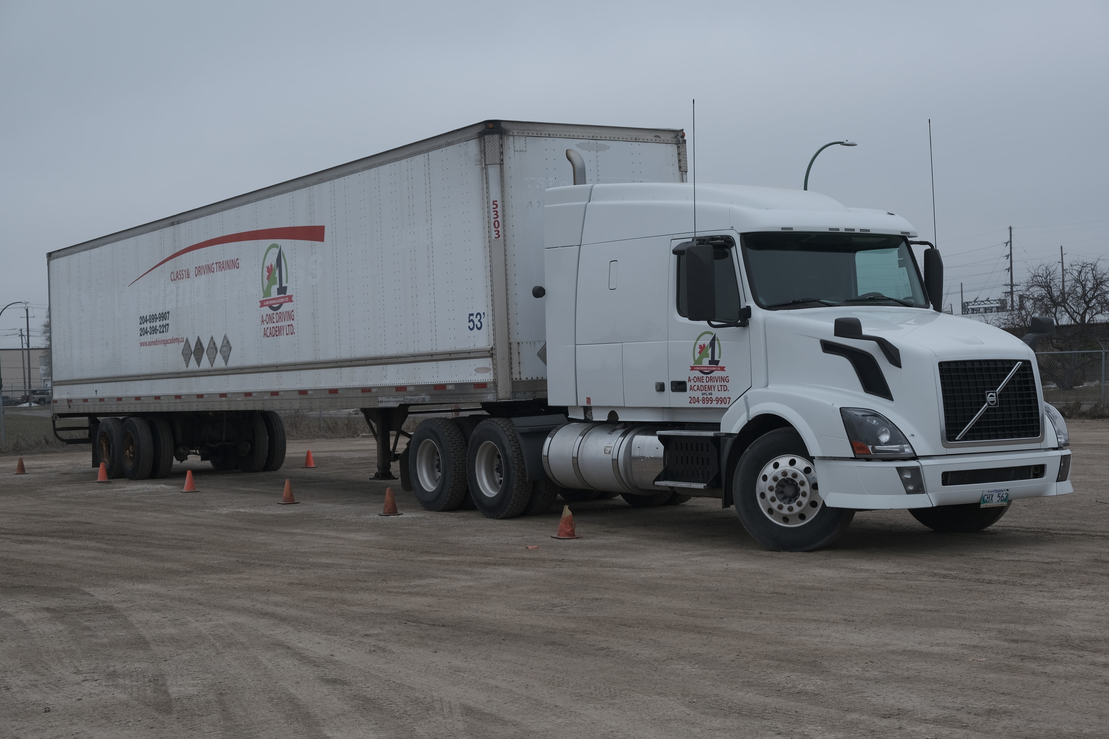 A-One Driving Academy branded Volvo semi-truck